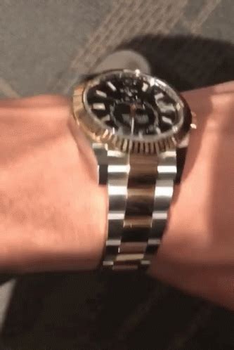 guy flexing Rolex gif